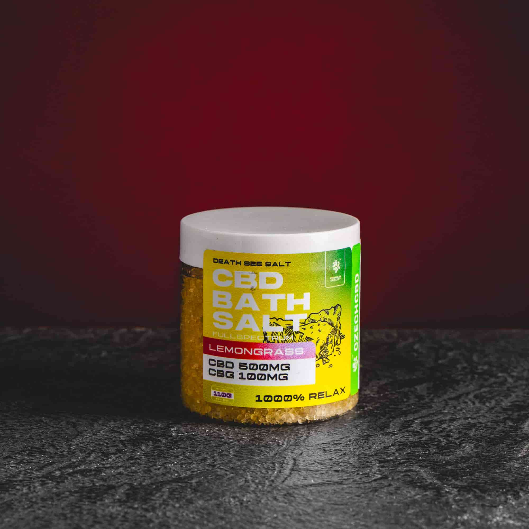 CBD соли за баня Kratom World с аромат лимонена трева, показани в продуктов кадър.