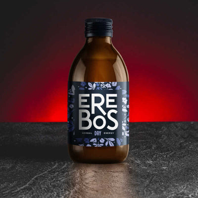 Erebos Dry Drink Kratom World, представен в продуктов кадър като билкова напитка със сух и освежаващ профил.
