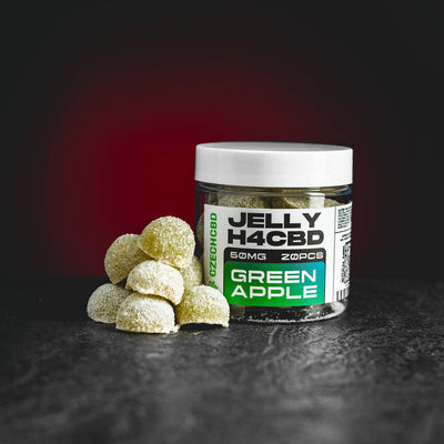 H4CBD Green Apple Jelly Kratom World, представени в продуктов кадър като H4CBD jelly edible продукт със зелен ябълков профил.