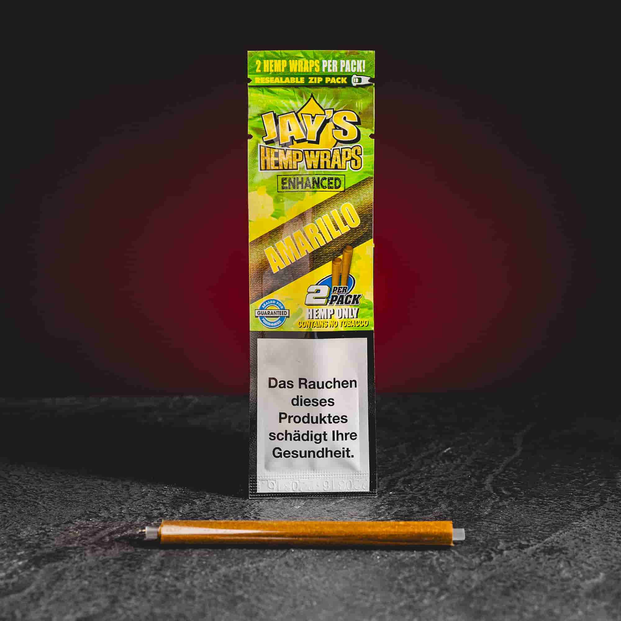 Juicy Amarillo hemp wrap Kratom World, представен в продуктов кадър като конопен аксесоар за CBD, HHC и билкови продукти.