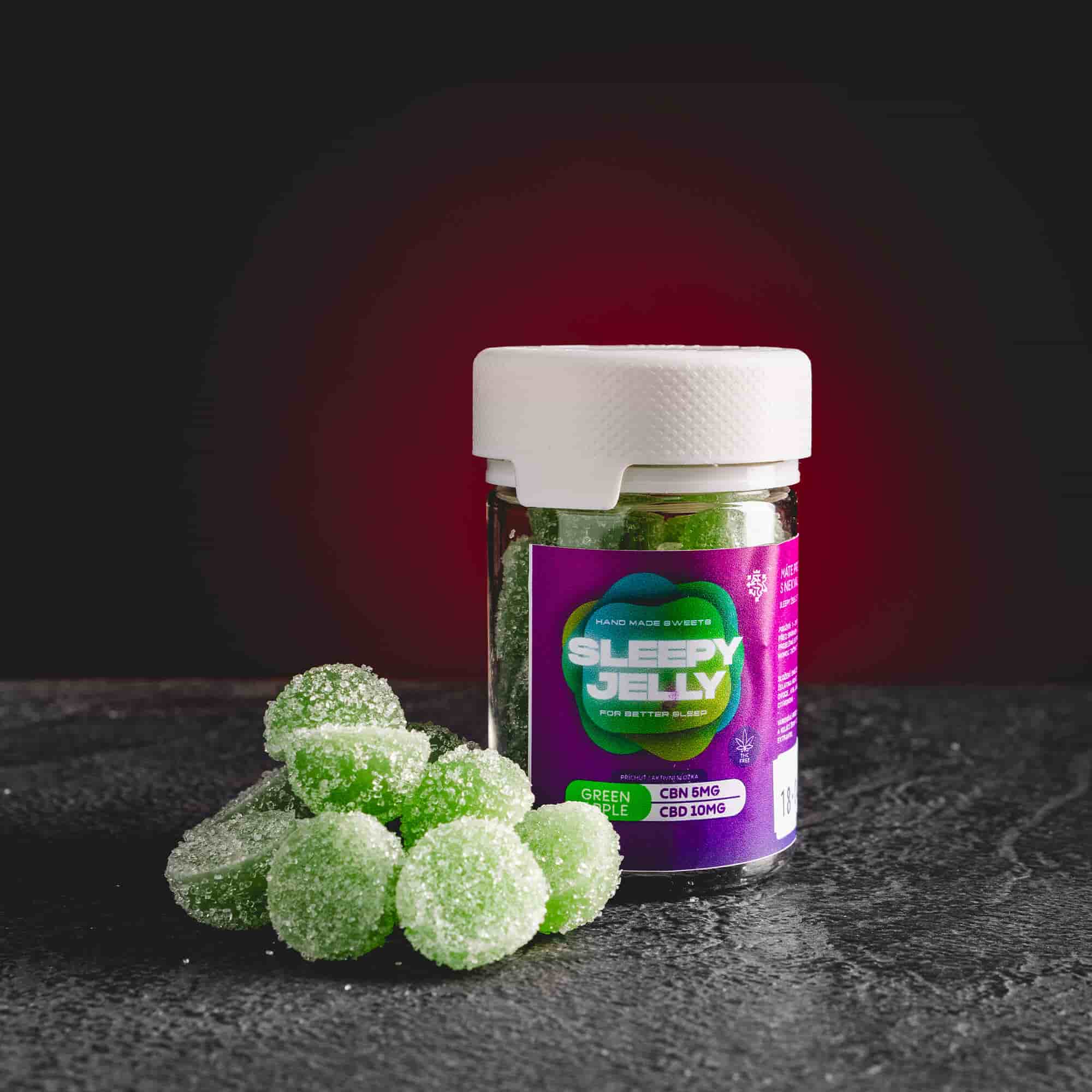 Sleep Jelly Green Apple Kratom World, представени в продуктов кадър като CBD jelly бонбони със зелен ябълков профил за сън и релаксация.