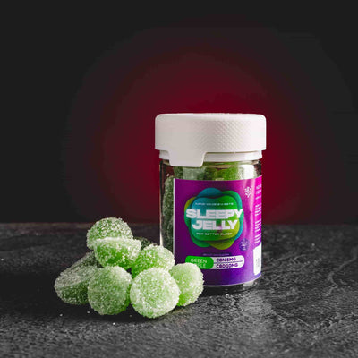 Sleep Jelly Green Apple Kratom World, представени в продуктов кадър като CBD jelly бонбони със зелен ябълков профил за сън и релаксация.