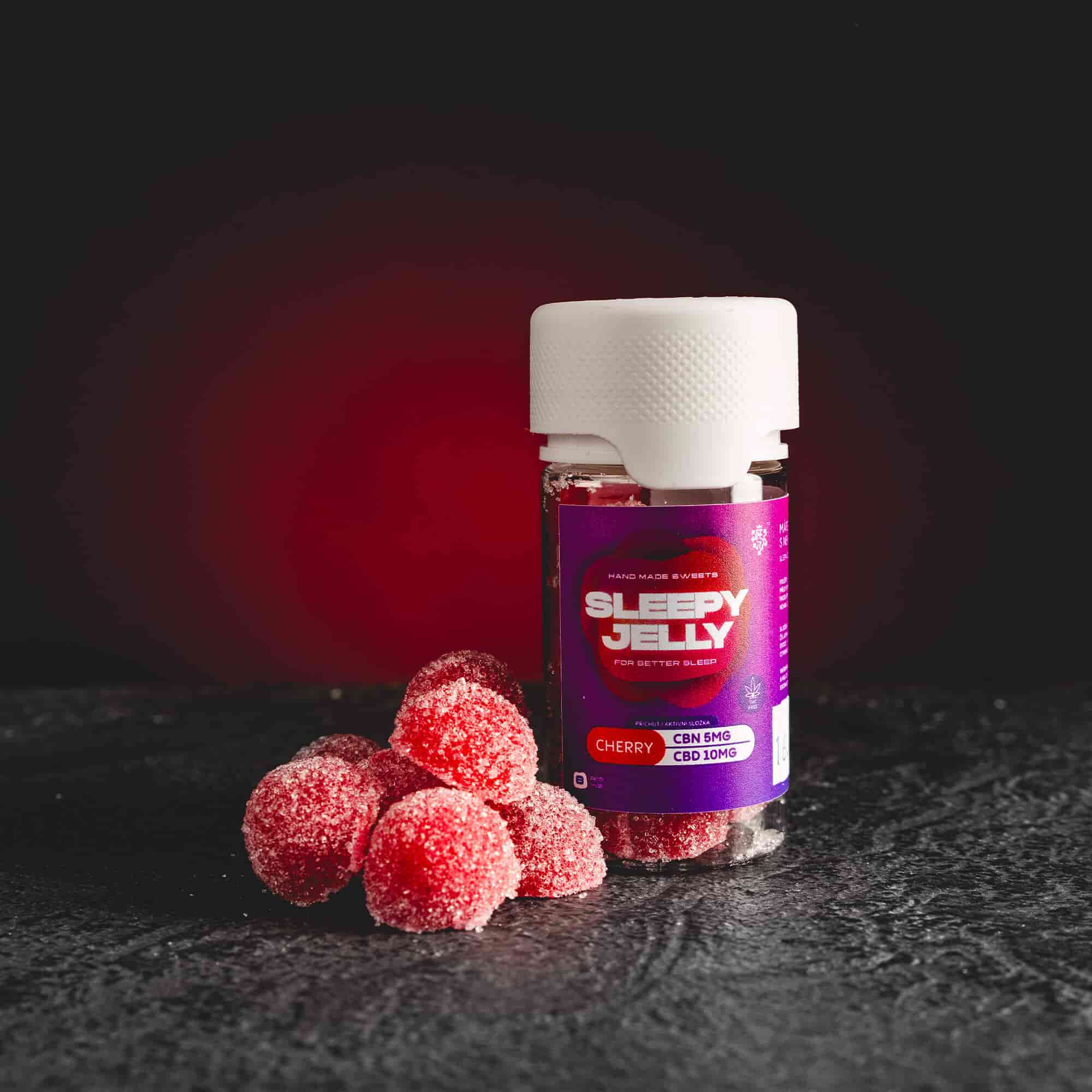 Sleepy Jelly Cherry Kratom World, представени в продуктов кадър като CBD jelly бонбони с черешов профил за сън и релаксация.