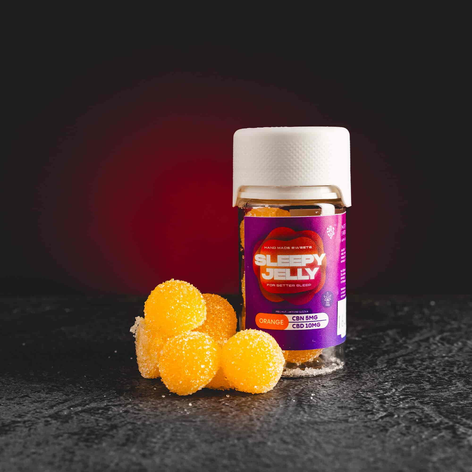 Sleepy Jelly Orange Kratom World, представени в продуктов кадър като CBD jelly бонбони с портокалов профил за сън и релаксация.