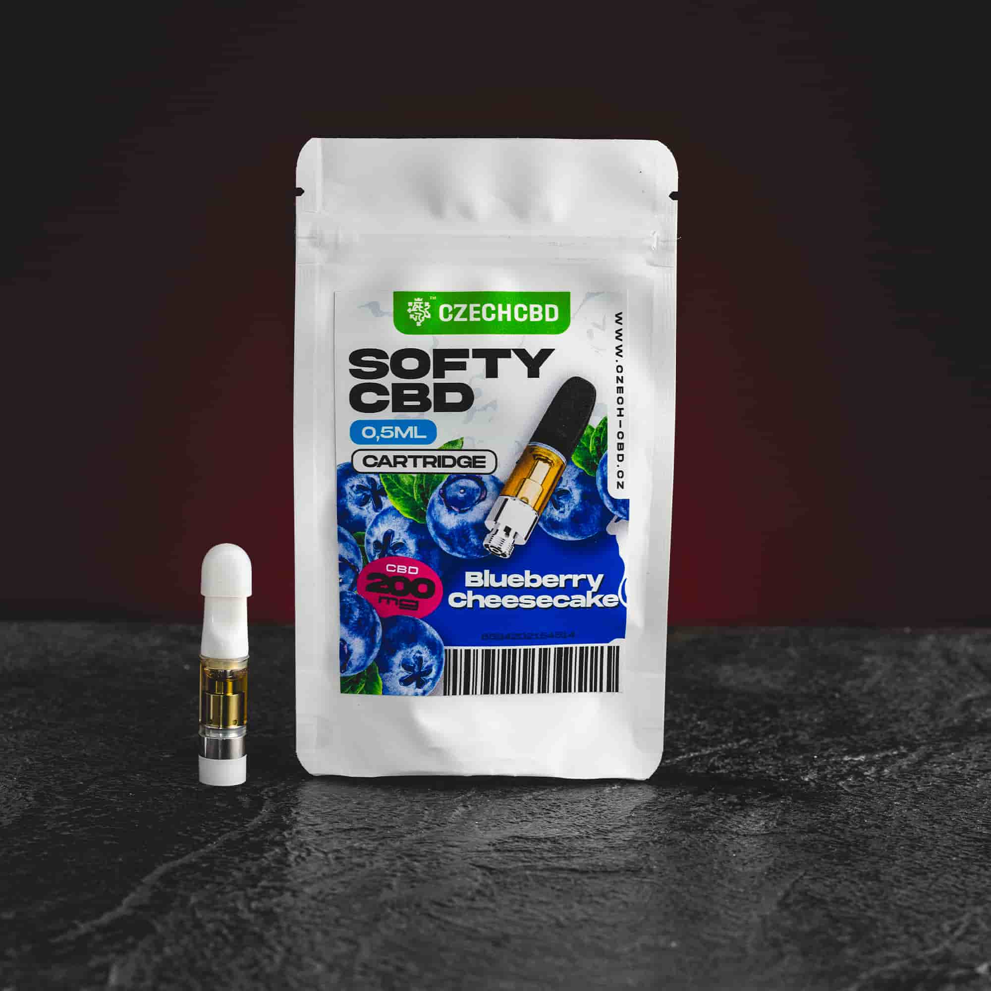 Softy CBD Cartridge Blueberry Cheesecake Kratom World, представен в продуктов кадър като CBD cartridge с боровинково-чийзкейк профил.