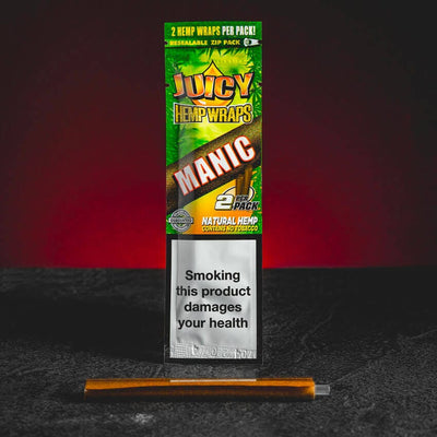Manic hemp wrap, представен в продуктов кадър като конопен аксесоар за CBD, HHC и билкови продукти.